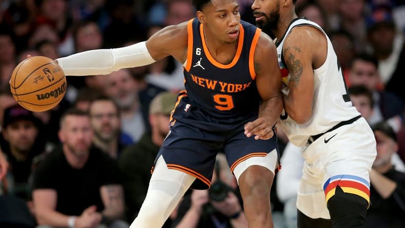 Mar 20, 2023; New York, New York, USA; New York Knicks guard RJ Barrett (9) controls the ball against Minnesota Timberwolves guard Mike Conley (10) during the second quarter at Madison Square Garden. Mandatory Credit: Brad Penner-USA TODAY Sports