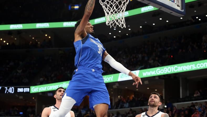 Mar 20, 2023; Memphis, Tennessee, USA; Dallas Mavericks forward Christian Wood (35) dunks during the first half against the Memphis Grizzlies at FedExForum. Mandatory Credit: Petre Thomas-USA TODAY Sports