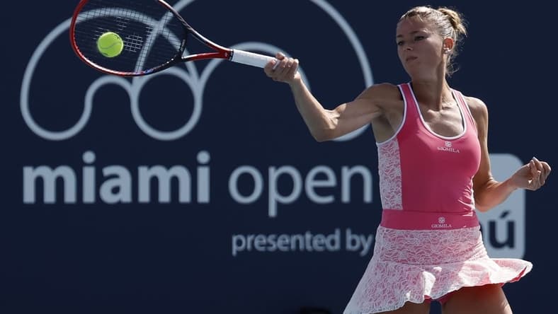 Mar 21, 2023; Miami, Florida, US; Camila Giorgi (ITA) hits a forehand against Kaia Kanepi (EST) (not pictured) during a on day two of the Miami Open at Hard Rock Stadium. Mandatory Credit: Geoff Burke-USA TODAY Sports