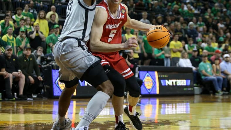 Wisconsin forward Tyler Wahl attempts to push past Oregon forward Quincy Guerrier as the Oregon Ducks host Wisconsin in the quarterfinal round of the NIT Tuesday, March 21, 2023 at Matthew Knight Arena in Eugene, Ore.
Ncaa Basketball Wisconsin At Oregon Mbb Nit Wisconsin At Oregon