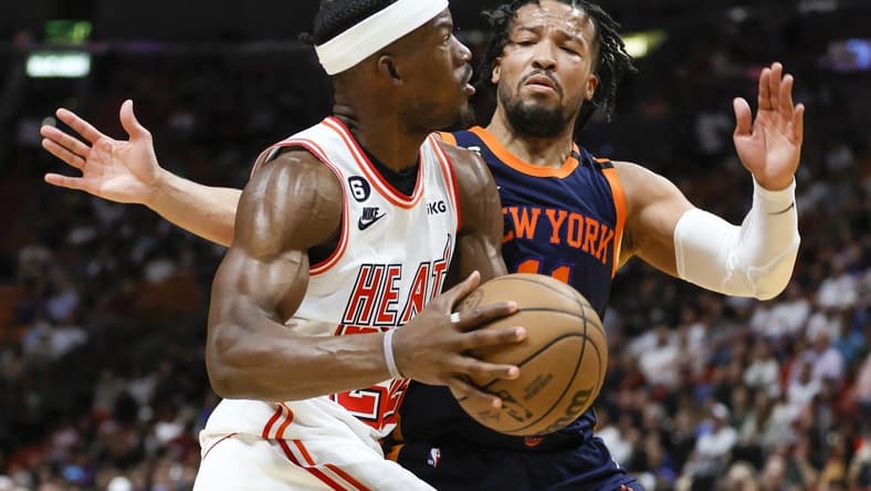Mar 22, 2023; Miami, Florida, USA; Miami Heat forward Jimmy Butler (22) drives to the basket against New York Knicks guard Jalen Brunson (11) during the third quarter at Miami-Dade Arena. Mandatory Credit: Sam Navarro-USA TODAY Sports