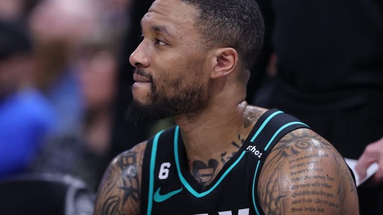 Mar 22, 2023; Salt Lake City, Utah, USA; Portland Trail Blazers guard Damian Lillard (0) looks on during a time out against the Utah Jazz in the third quarter at Vivint Arena. Mandatory Credit: Rob Gray-USA TODAY Sports