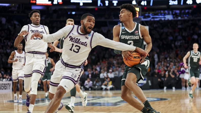 Mar 23, 2023; New York, NY, USA;  Kansas State Wildcats guard Desi Sills (13) reaches for the ball against Michigan State Spartans guard Jaden Akins (3) in the second half at Madison Square Garden. Mandatory Credit: Brad Penner-USA TODAY Sports