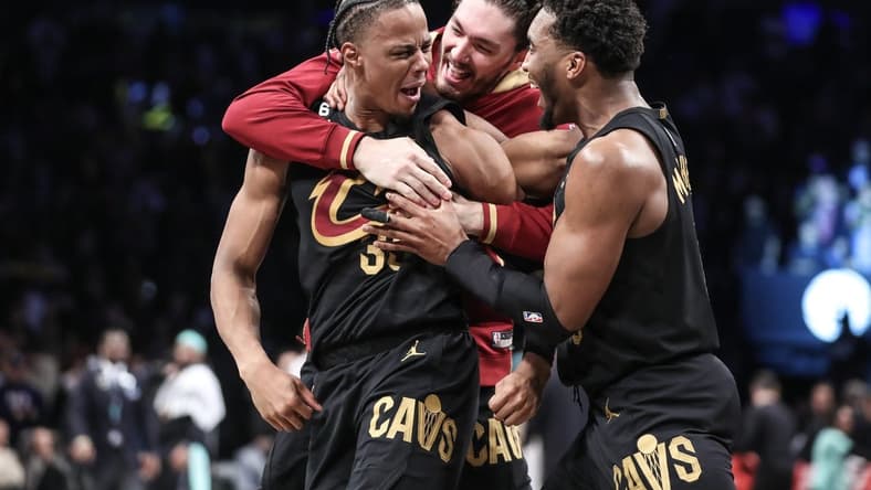 Mar 23, 2023; Brooklyn, New York, USA; Cleveland Cavaliers forward Isaac Okoro (35) celebrates with his teammates after scoring the game wining basket to beat the Brooklyn Nets 116-114 at Barclays Center. Mandatory Credit: Wendell Cruz-USA TODAY Sports