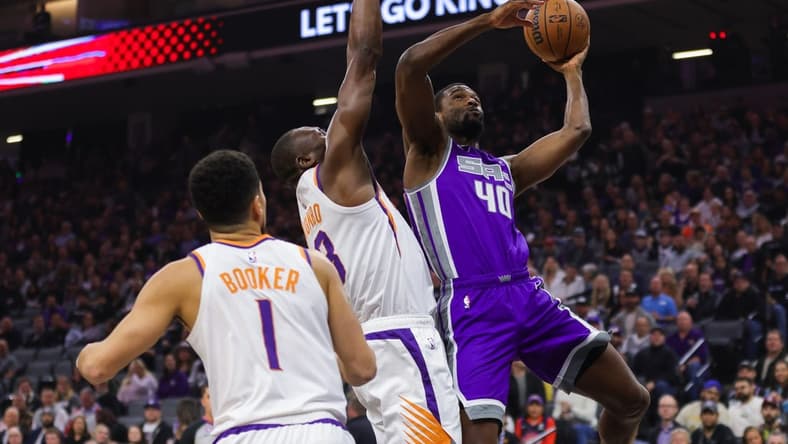 Mar 24, 2023; Sacramento, California, USA; Sacramento Kings forward Harrison Barnes (40) drives to the basket against Phoenix Suns center Bismack Biyombo (18) during the first quarter at Golden 1 Center. Mandatory Credit: Sergio Estrada-USA TODAY Sports