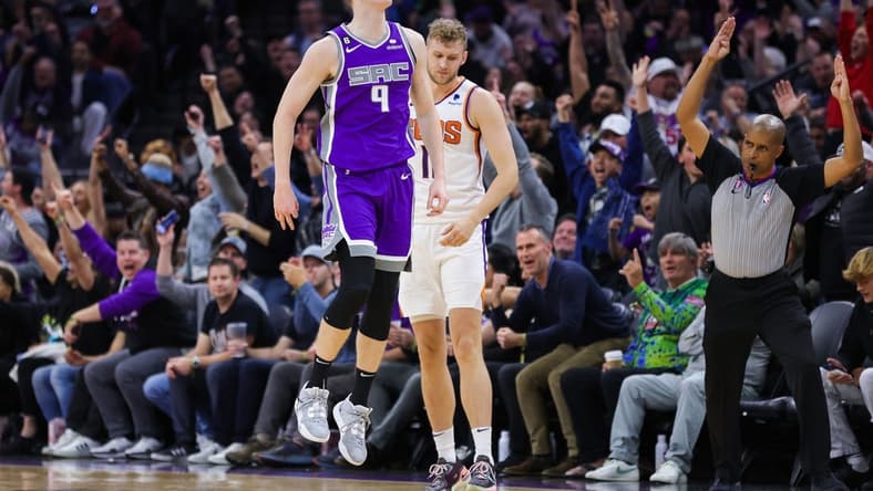 Mar 24, 2023; Sacramento, California, USA; Sacramento Kings guard Kevin Huerter (9) celebrates after a basket during the third quarter against the Phoenix Suns at Golden 1 Center. Mandatory Credit: Sergio Estrada-USA TODAY Sports