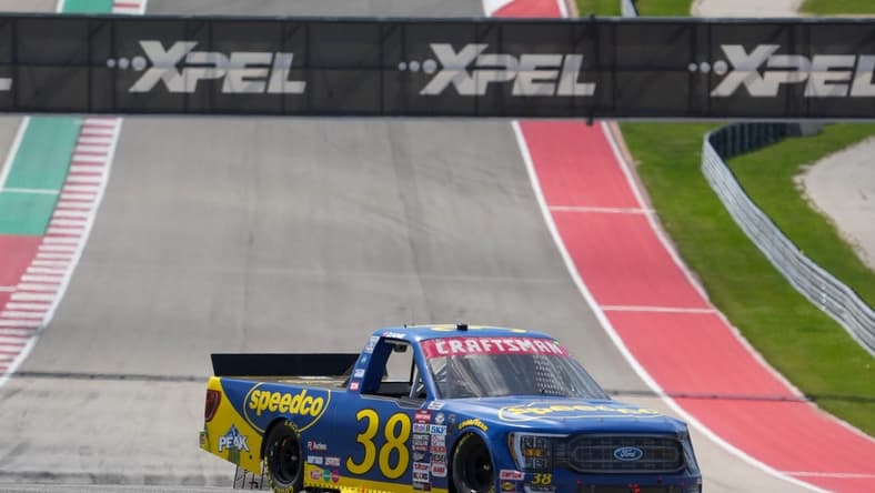 Mar 25, 2023; Austin, Texas, USA; NASCAR Craftsman Truck Series driver Zane Smith (38) goes into turn eleven at Circuit of the Americas. Mandatory Credit: Daniel Dunn-USA TODAY Sports