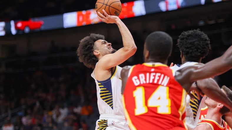 Mar 25, 2023; Atlanta, Georgia, USA; Indiana Pacers forward Jordan Nwora (13) shoots against the Atlanta Hawks in the second quarter at State Farm Arena. Mandatory Credit: Brett Davis-USA TODAY Sports