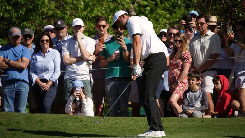 Mar 25, 2023; Austin, Texas, USA; Scotty Scheffler chips from the fairway at the sixteenth hole in a match against Jason Day during the fourth round of the World Golf Championships-Dell Technologies Match Play golf tournament. Mandatory Credit: Dustin Safranek-USA TODAY Sports