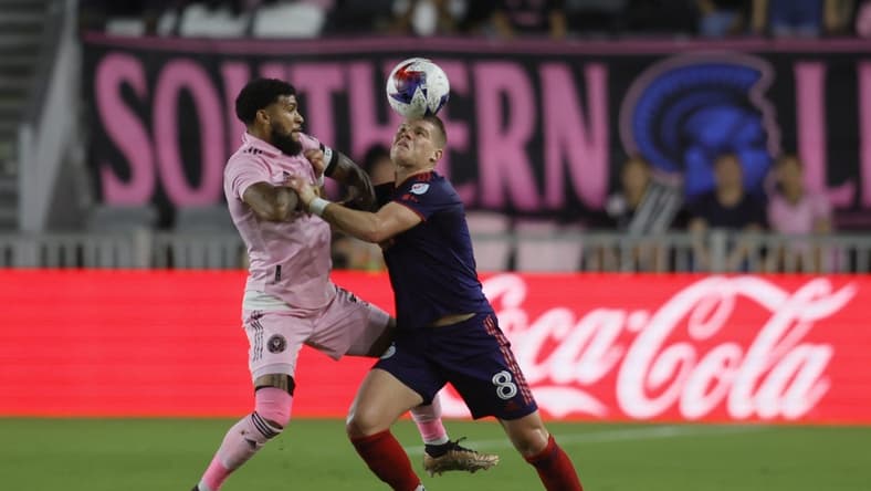Mar 25, 2023; Fort Lauderdale, Florida, USA; Chicago Fire forward Chris Mueller (8) and Inter Miami defender DeAndre Yedlin (2) fights for the ball at DRV PNK Stadium. Mandatory Credit: Sam Navarro-USA TODAY Sports