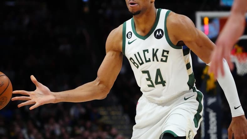 Mar 25, 2023; Denver, Colorado, USA; Milwaukee Bucks forward Giannis Antetokounmpo (34) passes the ball in the second quarter against the Denver Nuggets at Ball Arena. Mandatory Credit: Ron Chenoy-USA TODAY Sports