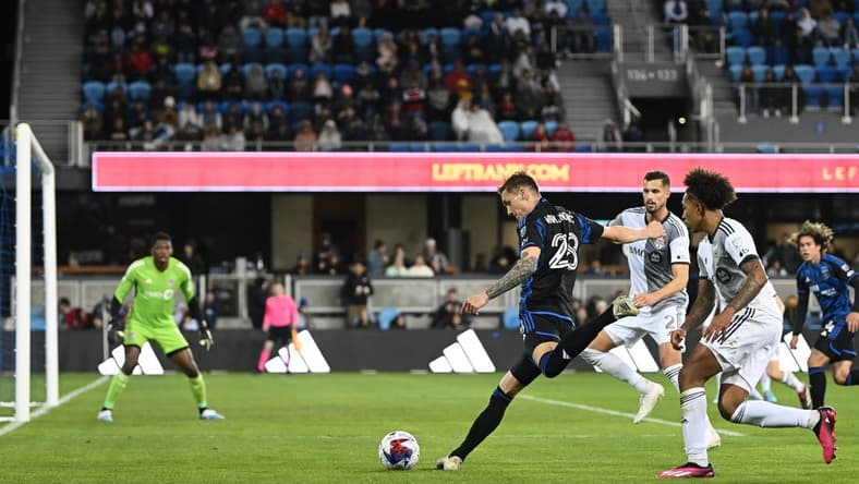 Mar 25, 2023; San Jose, California, USA; San Jose Earthquakes forward Benji Kikanovic (28) kicks the ball against Toronto FC goalkeeper Sean Johnson (1) during the first half at PayPal Park. Mandatory Credit: Robert Edwards-USA TODAY Sports