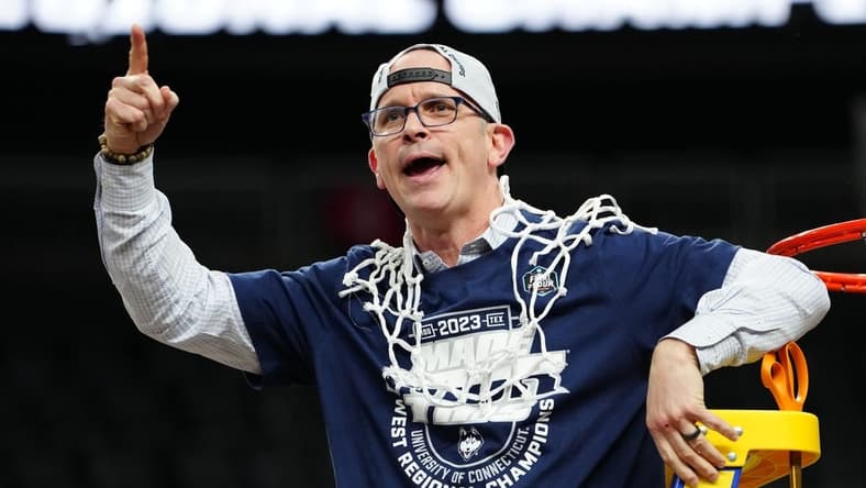 Mar 25, 2023; Las Vegas, NV, USA; Connecticut Huskies head coach Dan Hurley reacts after cutting down the net following a victory against the Gonzaga Bulldogs in the NCAA tournament West Regional final at T-Mobile Arena. Mandatory Credit: Stephen R. Sylvanie-USA TODAY Sports