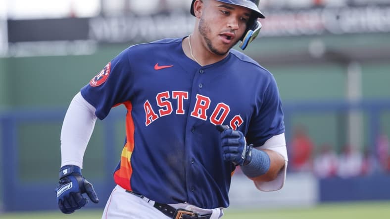 Mar 26, 2023; West Palm Beach, Florida, USA; Houston Astros catcher Yainer Diaz (21) rounds third base following a grand-slam home run during the second inning against the St. Louis Cardinals at The Ballpark of the Palm Beaches. Mandatory Credit: Reinhold Matay-USA TODAY Sports