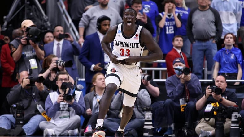 Mar 26, 2023; Louisville, KY, USA; San Diego State Aztecs forward Aguek Arop (33) celebrates a basket during the second half against the Creighton Bluejays at the NCAA Tournament South Regional-Creighton vs San Diego State at KFC YUM! Center. Mandatory Credit: Jordan Prather-USA TODAY Sports