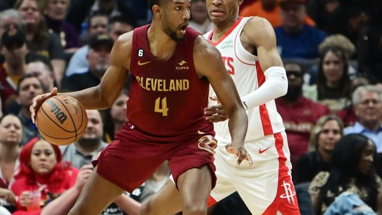 Mar 26, 2023; Cleveland, Ohio, USA; Houston Rockets forward Jabari Smith Jr. (1) defends against Cleveland Cavaliers forward Evan Mobley (4) during the first half at Rocket Mortgage FieldHouse. Mandatory Credit: Ken Blaze-USA TODAY Sports