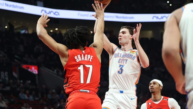 Mar 26, 2023; Portland, Oregon, USA;  Oklahoma City Thunder guard Josh Giddey (3) shoots the ball over Portland Trail Blazers guard Shaedon Sharpe (17) in the first half at Moda Center. Mandatory Credit: Jaime Valdez-USA TODAY Sports