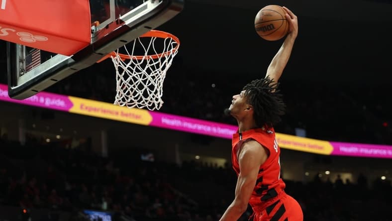 Mar 26, 2023; Portland, Oregon, USA; Portland Trail Blazers guard Shaedon Sharpe (17) dunks the ball in the second half against the Oklahoma City Thunder at Moda Center. Mandatory Credit: Jaime Valdez-USA TODAY Sports