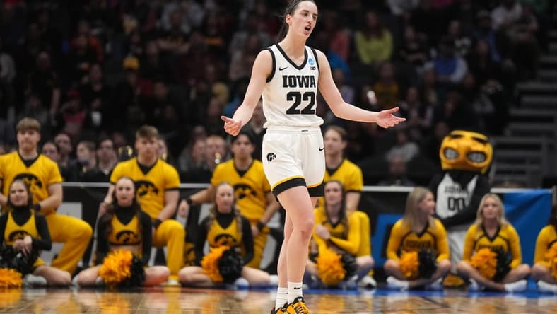 Mar 26, 2023; Seattle, WA, USA; Iowa Hawkeyes guard Caitlin Clark (22) reacts against the Louisville Cardinals in the first half at Climate Pledge Arena. Mandatory Credit: Kirby Lee-USA TODAY Sports