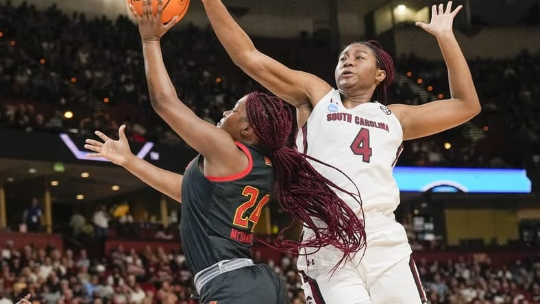 Mar 27, 2023; Greenville, SC, USA; South Carolina Gamecocks forward Aliyah Boston (4) blocks a shot by Maryland Terrapins guard Bri McDaniel (24) during the first half at the NCAA Women   s Tournament at Bon Secours Wellness Arena. Mandatory Credit: Jim Dedmon-USA TODAY Sports