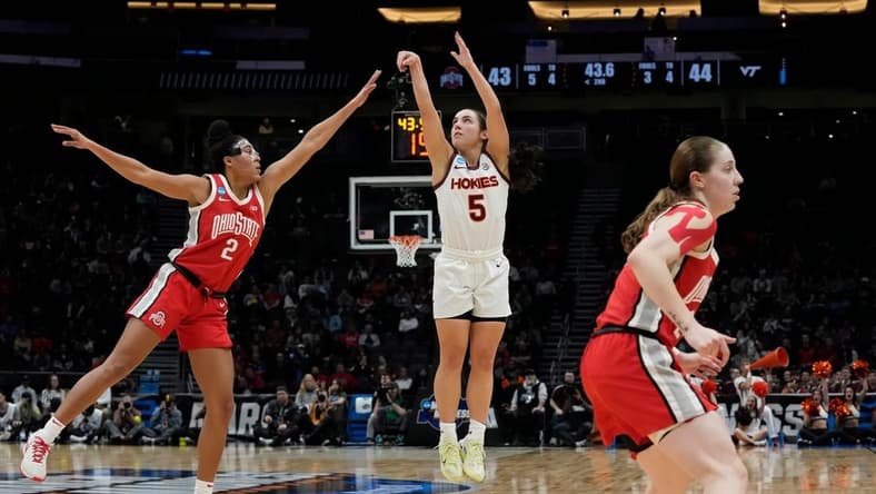 March 27, 2023; Seattle, WA, USA; Virginia Tech Hokies guard Georgia Amoore (5) shoots while guarded by Ohio State Buckeyes forward Taylor Thierry (2) during the first half of an NCAA Tournament Elite Eight basketball game at Climate Pledge Arena in Seattle on Monday. Mandatory Credit: Barbara J. Perenic/Columbus Dispatch
Ceb Osu Vt Ncaa Bjp 18
