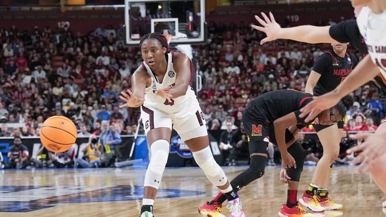 Mar 27, 2023; Greenville, SC, USA; South Carolina Gamecocks forward Aliyah Boston (4) passes off against the Maryland Terrapins during the second half at the NCAA Women s Tournament at Bon Secours Wellness Arena. Mandatory Credit: Jim Dedmon-USA TODAY Sports
