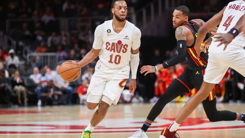 Mar 28, 2023; Atlanta, Georgia, USA; Cleveland Cavaliers guard Darius Garland (10) dribbles against the Atlanta Hawks in the first quarter at State Farm Arena. Mandatory Credit: Brett Davis-USA TODAY Sports