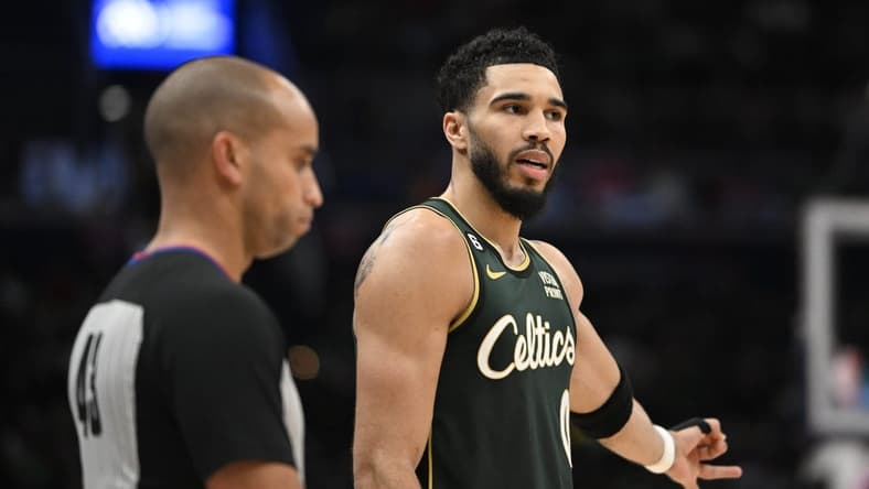 Mar 28, 2023; Washington, District of Columbia, USA; Boston Celtics forward Jayson Tatum (0) talks with referee Matt Myers (43) during the second half at Capital One Arena. Mandatory Credit: Brad Mills-USA TODAY Sports