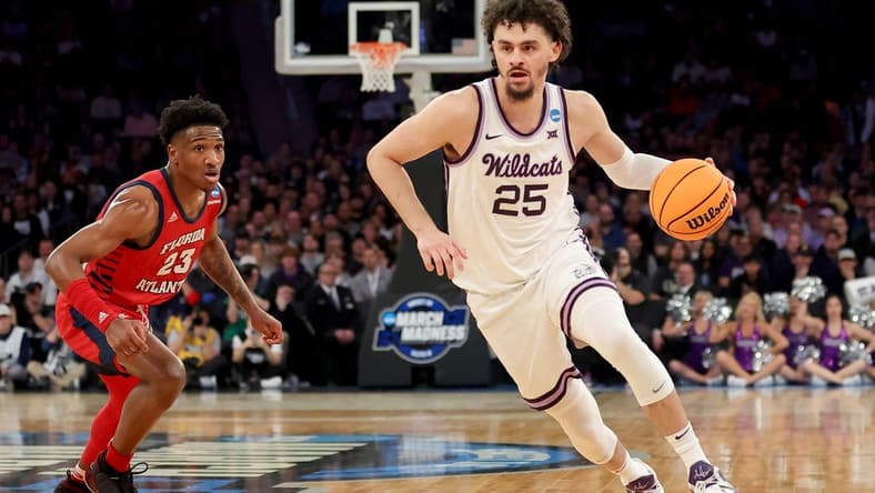 Mar 25, 2023; New York, NY, USA; Kansas State Wildcats forward Ismael Massoud (25) drives to the basket against Florida Atlantic Owls guard Brandon Weatherspoon (23) during the first half at Madison Square Garden. Mandatory Credit: Brad Penner-USA TODAY Sports