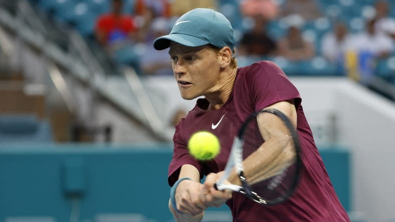 Mar 29, 2023; Miami, Florida, US; Jannik Sinner (ITA) hits a backhand against Emil Ruusuvuori (FIN) (not pictured) in a men's singles quarterfinal on day ten of the Miami Open at Hard Rock Stadium. Mandatory Credit: Geoff Burke-USA TODAY Sports