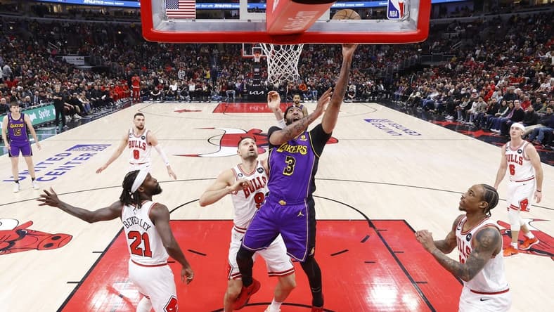 Mar 29, 2023; Chicago, Illinois, USA; Los Angeles Lakers forward Anthony Davis (3) goes to the basket against the Chicago Bulls during the first half at United Center. Mandatory Credit: Kamil Krzaczynski-USA TODAY Sports