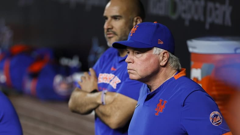 Mar 30, 2023; Miami, Florida, USA; New York Mets manager Buck Showalter (11) looks on from inside the dugout prior to the game against the Miami Marlins at loanDepot Park. Mandatory Credit: Sam Navarro-USA TODAY Sports