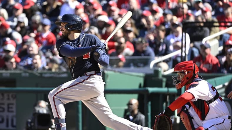 Mar 30, 2023; Washington, District of Columbia, USA; Atlanta Braves catcher Travis d'Arnaud (16) singles against the Washington Nationals during the sixth inning at Nationals Park. Mandatory Credit: Brad Mills-USA TODAY Sports