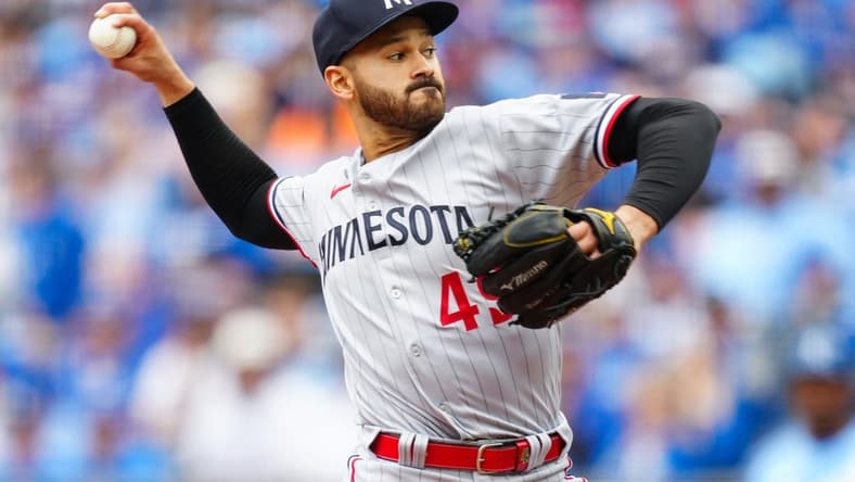 Mar 30, 2023; Kansas City, Missouri, USA; Minnesota Twins starting pitcher Pablo Lopez (49) pitches during the first inning against the Kansas City Royals at Kauffman Stadium. Mandatory Credit: Jay Biggerstaff-USA TODAY Sports