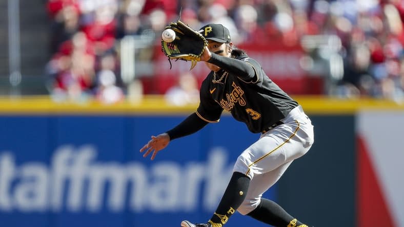 Mar 30, 2023; Cincinnati, Ohio, USA; Pittsburgh Pirates second baseman Ji Hwan Bae (3) catches a ball to force out Cincinnati Reds third baseman Spencer Steer (not pictured) in the second inning at Great American Ball Park. Mandatory Credit: Katie Stratman-USA TODAY Sports