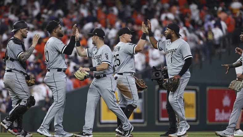 Mar 30, 2023; Houston, Texas, USA; Chicago White Sox first baseman Andrew Vaughn (25) celebrates with teammates after the White Sox defeated the Houston Astros at Minute Maid Park. Mandatory Credit: Troy Taormina-USA TODAY Sports