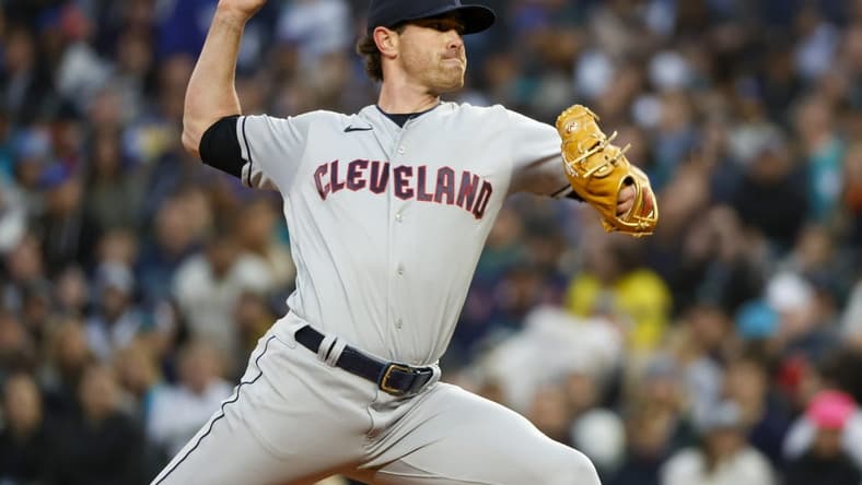 Mar 30, 2023; Seattle, Washington, USA; Cleveland Guardians starting pitcher Shane Bieber (57) throws against the Seattle Mariners during the first inning at T-Mobile Park. Mandatory Credit: Joe Nicholson-USA TODAY Sports