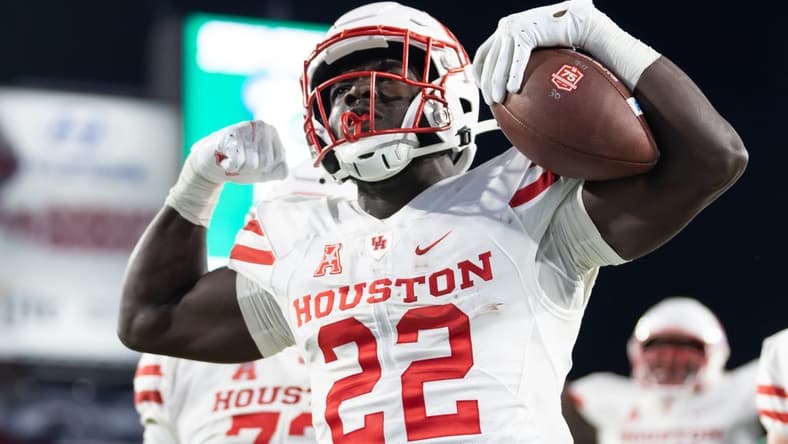 Nov 6, 2021; Tampa, Florida, USA; Houston Cougars running back Alton McCaskill (22) reacts after scoring a touchdown during the second half against the South Florida Bulls at Raymond James Stadium. Mandatory Credit: Matt Pendleton-USA TODAY Sports