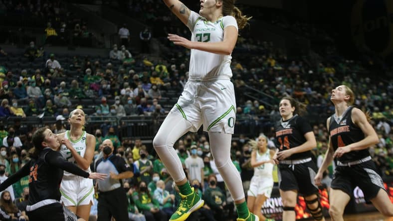Oregon's Sedona Prince, center, goes up for a shot during the second half against  Idaho State.

Eug 031522 Prince 03