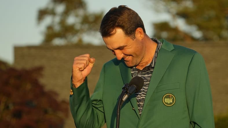 Apr 10, 2022; Augusta, Georgia, USA; Scottie Scheffler speaks to the crowd during the Green Jacket Ceremony after winning the 2022 Masters Tournament during the final round of the Masters Tournament at Augusta National Golf Club. Mandatory Credit: Adam Cairns-Augusta Chronicle/USA TODAY Sports