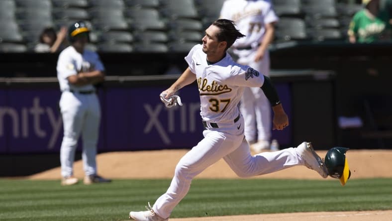 Aug 10, 2022; Oakland, California, USA; Oakland Athletics center fielder Cal Stevenson (37) scores on a three-RBI double by Tony Kemp (not pictured) during the seventh inning against the Los Angeles Angels at RingCentral Coliseum. Mandatory Credit: D. Ross Cameron-USA TODAY Sports