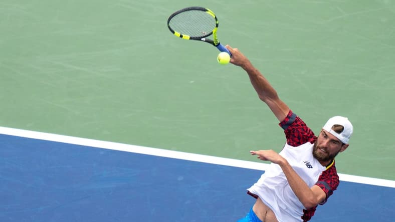 Maxime Cressy hits a slam while playing against Botic van de Zandschulp at the Western & Southern Open at the Lindner Family Tennis Center in Mason, Ohio, on Sunday, Aug. 14, 2022.
Western Southern Open Day One 012