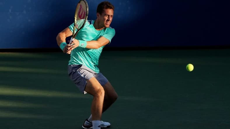 Sep 1, 2022; Flushing, NY, USA; Roberto Carballes Baena of Spain hits a shot against Denis Shapovalov of Canada on day four of the 2022 U.S. Open tennis tournament at USTA Billie Jean King Tennis Center. Mandatory Credit: Jerry Lai-USA TODAY Sports