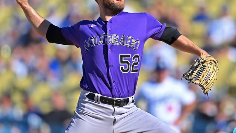 Oct 2, 2022; Los Angeles, California, USA;  Colorado Rockies relief pitcher Daniel Bard (52) earns a save in the ninth inning against the Colorado Rockies at Dodger Stadium. Mandatory Credit: Jayne Kamin-Oncea-USA TODAY Sports