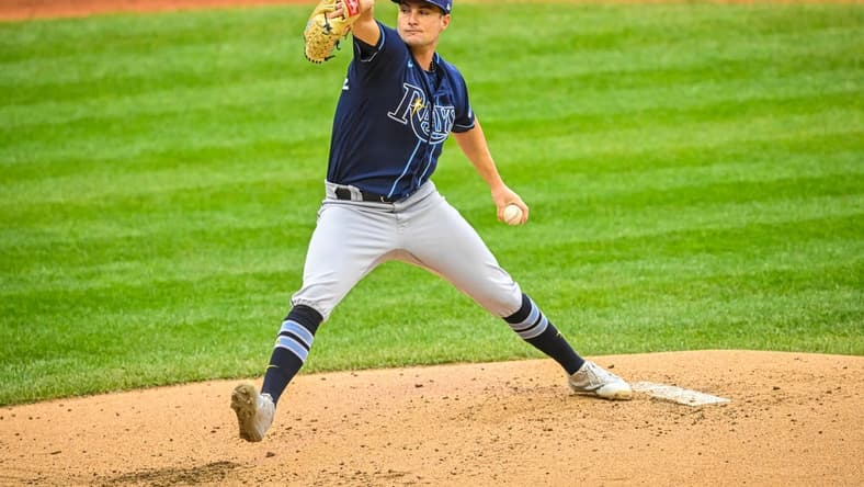 Oct 7, 2022; Cleveland, Ohio, USA; Tampa Bay Rays starting pitcher Shane McClanahan (18) throws a pitch against the Cleveland Guardians in the second inning during game one of the Wild Card series for the 2022 MLB Playoffs at Progressive Field. Mandatory Credit: David Richard-USA TODAY Sports