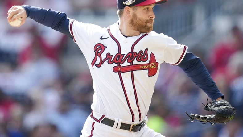 Oct 11, 2022; Atlanta, Georgia, USA; Atlanta Braves relief pitcher Collin McHugh (32) throws against the Philadelphia Phillies in the sixth inning during game one of the NLDS for the 2022 MLB Playoffs at Truist Park. Mandatory Credit: Dale Zanine-USA TODAY Sports