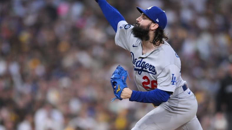 Oct 14, 2022; San Diego, California, USA; Los Angeles Dodgers starting pitcher Tony Gonsolin (26) throws a pitch in the first inning against the San Diego Padres during game three of the NLDS for the 2022 MLB Playoffs at Petco Park. Mandatory Credit: Orlando Ramirez-USA TODAY Sports