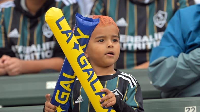 Oct 15, 2022; Carson, California, US; A young Los Angeles Galaxy fans looks on during the game against Nashville SC at Dignity Health Sports Park. Mandatory Credit: Jayne Kamin-Oncea-USA TODAY Sports