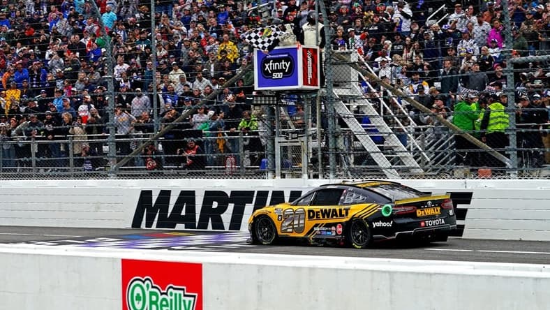 Oct 30, 2022; Martinsville, Virginia, USA; NASCAR Cup Series driver Christopher Bell (20) wins the Xfinity 500 at Martinsville Speedway. Mandatory Credit: Peter Casey-USA TODAY Sports