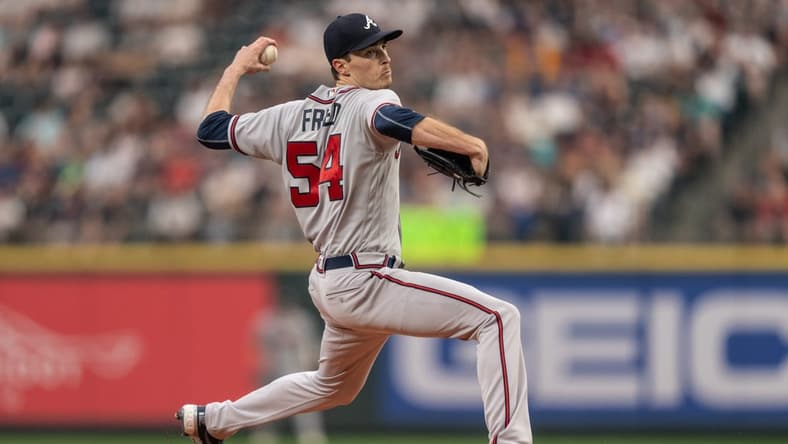 Atlanta Braves starter Max Fried (54) delivers a pitch against the Seattle Mariners at T-Mobile Park. Mandatory Credit: Stephen Brashear-USA TODAY Sports